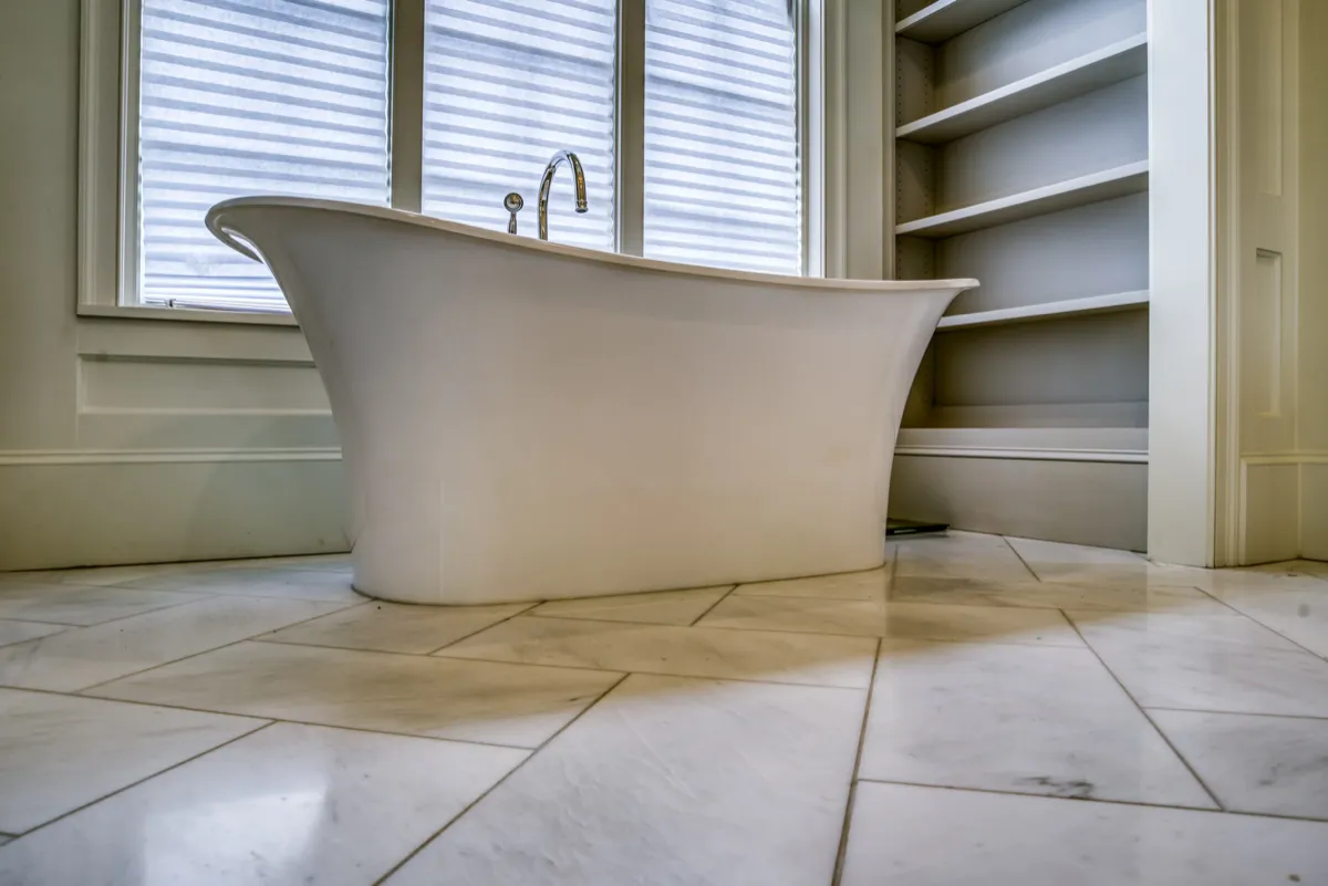 Tile Bathroom Floor with Freestanding Tub